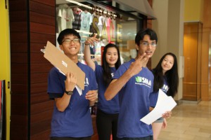 Team of Romil, Jun, Serina and Melody at a station in the mall.